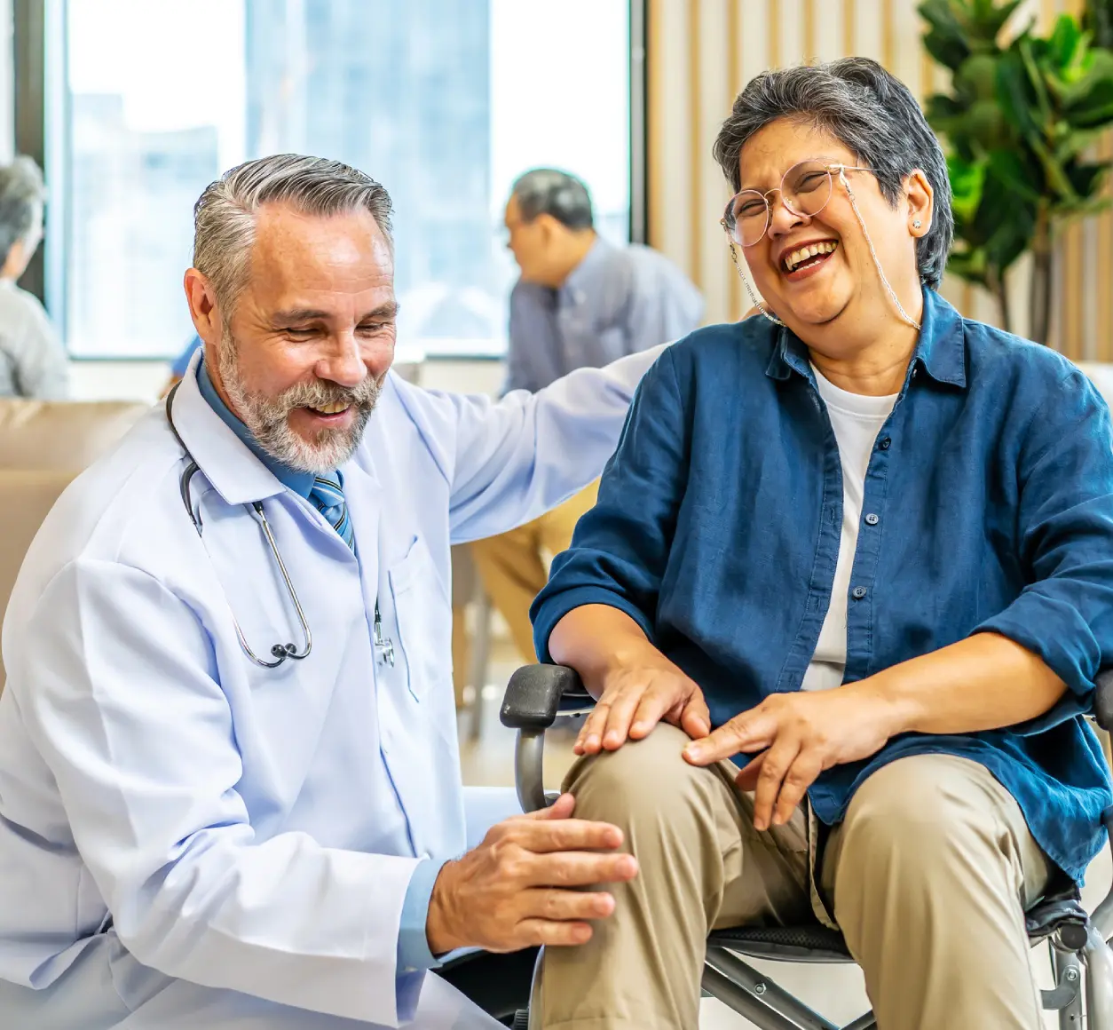 Doctor and patient sharing a joyful moment.